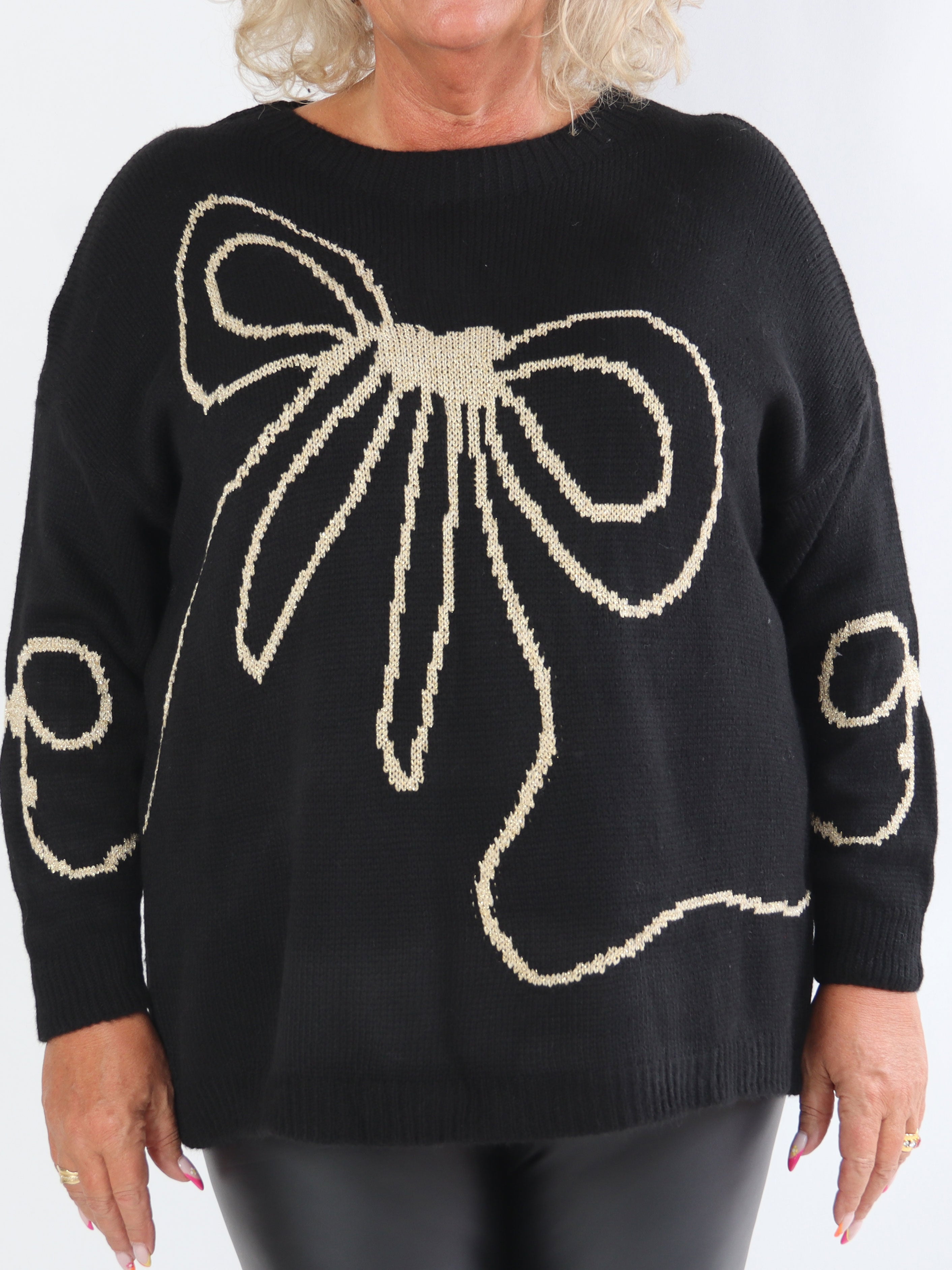 Ruby - Stickad tröja i plus size med rosett i ull och guldtråd